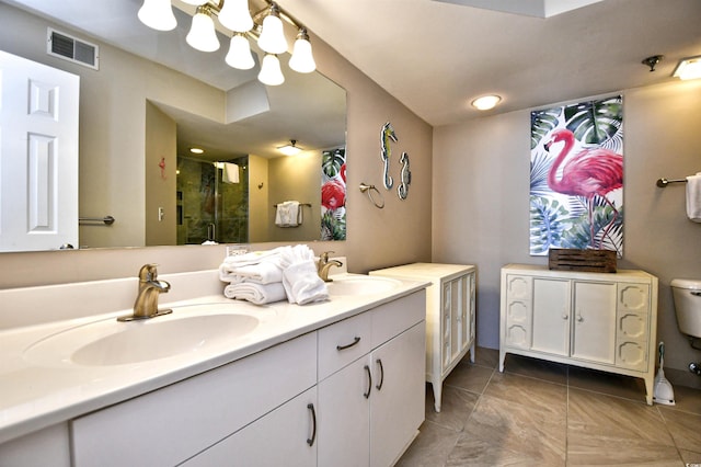 3601 S Ocean Blvd Unit 7-E, North Myrtle Beach, SC 29582 - bathroom with double vanity, a stall shower, and tile patterned flooring