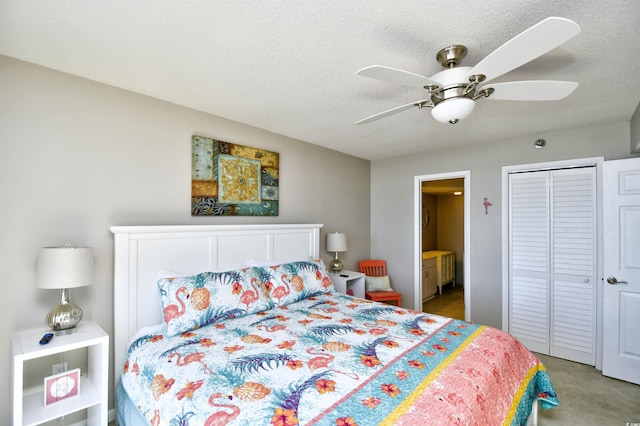 3601 S Ocean Blvd Unit 7-E, North Myrtle Beach, SC 29582 - bedroom featuring a closet, a textured ceiling, a ceiling fan, ensuite bathroom, and light carpet
