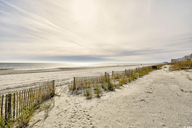 3601 S Ocean Blvd Unit 7-E, North Myrtle Beach, SC 29582 - view of yard featuring view of water and beach