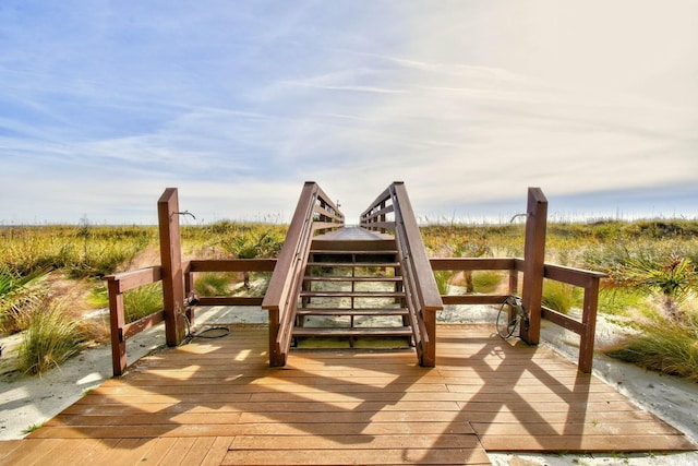 3601 S Ocean Blvd Unit 7-E, North Myrtle Beach, SC 29582 - wooden deck with stairway