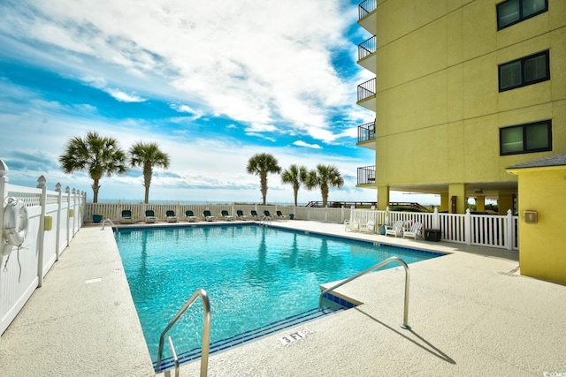 3601 S Ocean Blvd Unit 7-E, North Myrtle Beach, SC 29582 - community pool featuring a patio