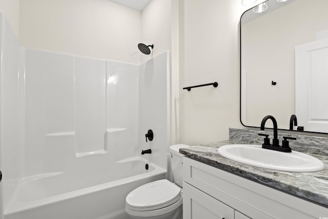 full bathroom with shower / bathing tub combination, vanity, and toilet