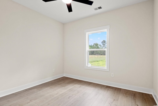 unfurnished room featuring ceiling fan and light hardwood / wood-style floors