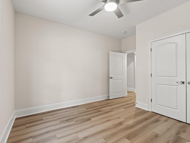 unfurnished bedroom with a closet, ceiling fan, and light hardwood / wood-style floors