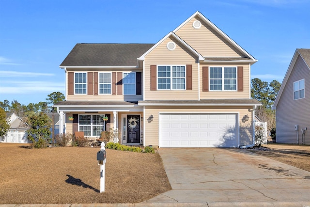 view of front of property featuring a garage