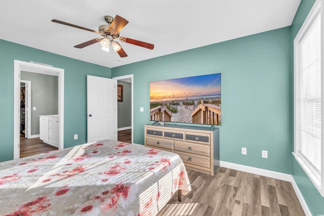 bedroom featuring ceiling fan and hardwood / wood-style floors