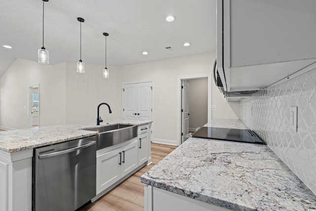 kitchen with dishwasher, sink, pendant lighting, a center island with sink, and white cabinets