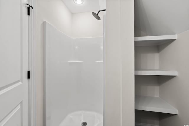 bathroom with a shower