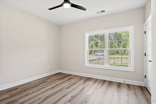 unfurnished room featuring light hardwood / wood-style floors and ceiling fan