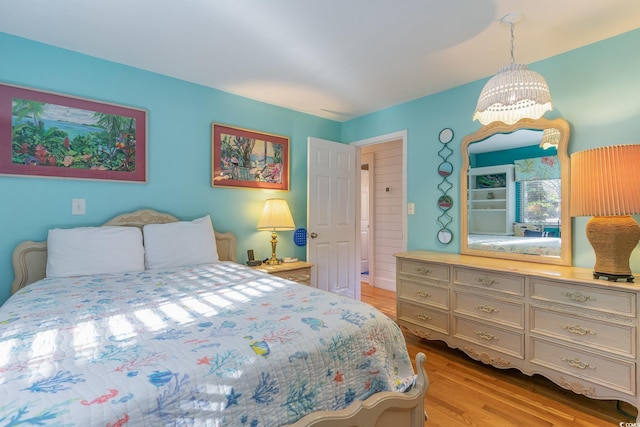 bedroom with light wood-type flooring