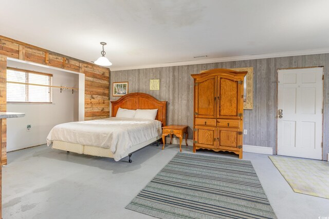 bedroom featuring wood walls and ornamental molding