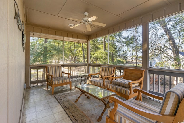 sunroom / solarium with ceiling fan