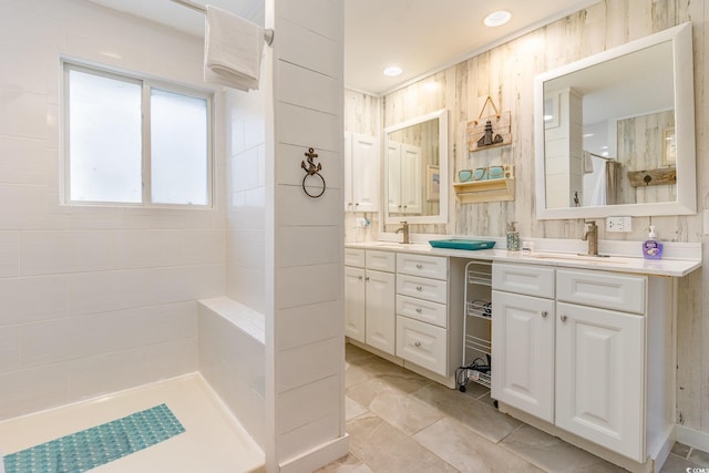 bathroom with tile patterned floors and vanity