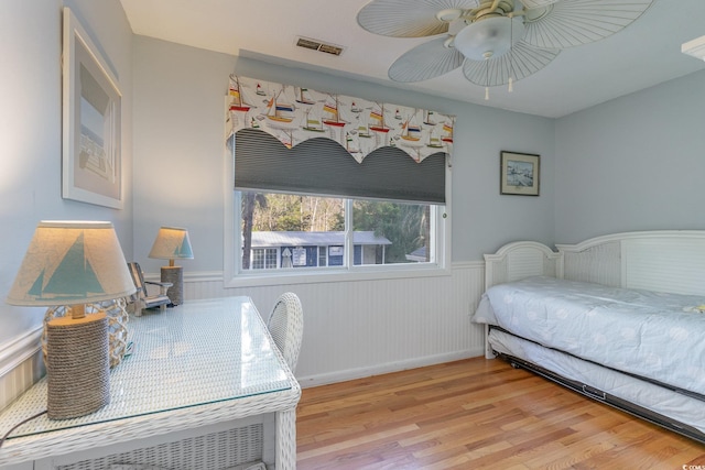 bedroom featuring ceiling fan and light hardwood / wood-style floors