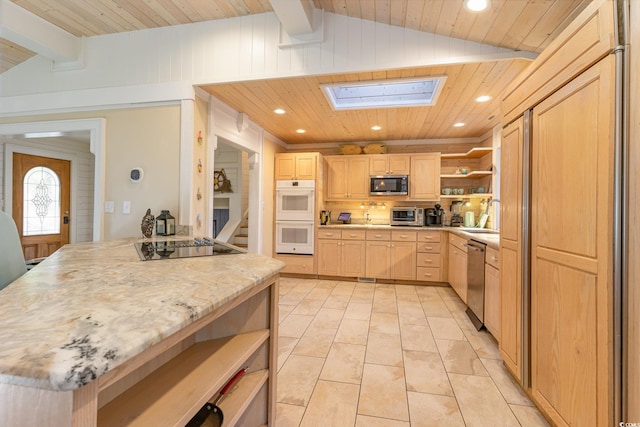 kitchen featuring light brown cabinets, wooden ceiling, sink, vaulted ceiling with skylight, and appliances with stainless steel finishes