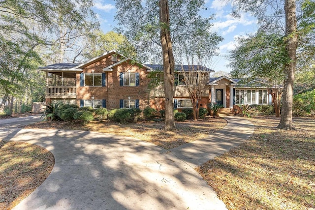 view of front of property with a sunroom