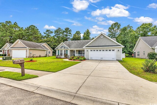 single story home with a front yard, a garage, and covered porch