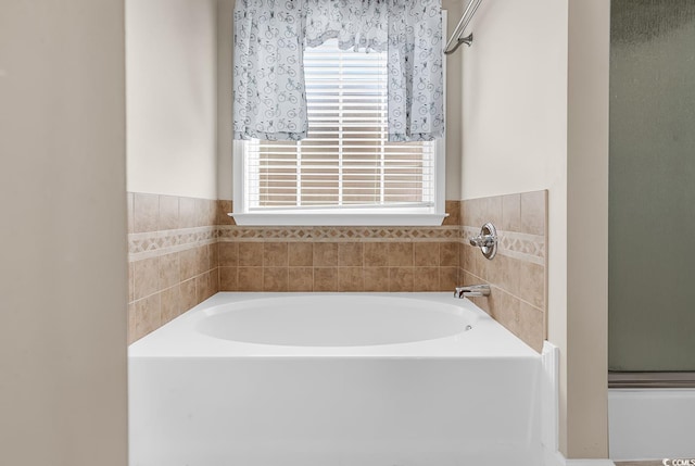 full bathroom featuring a garden tub