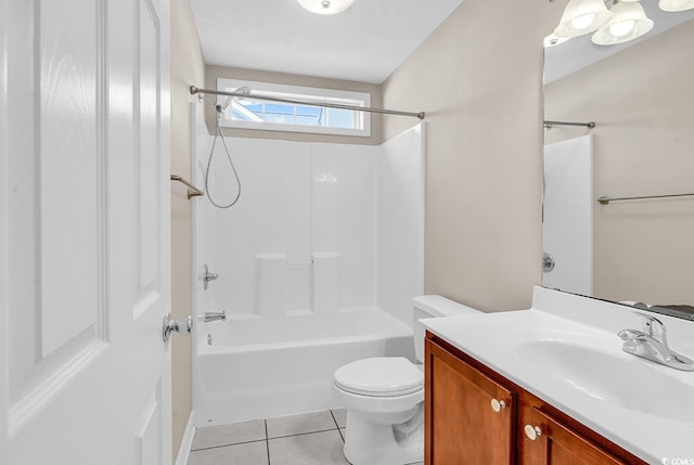 bathroom with toilet, vanity, tub / shower combination, and tile patterned floors