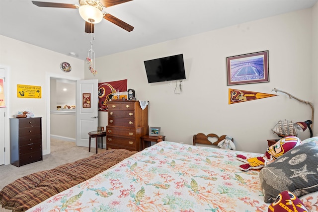 bedroom featuring ceiling fan and light carpet