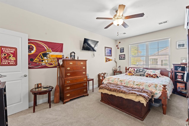 carpeted bedroom featuring ceiling fan