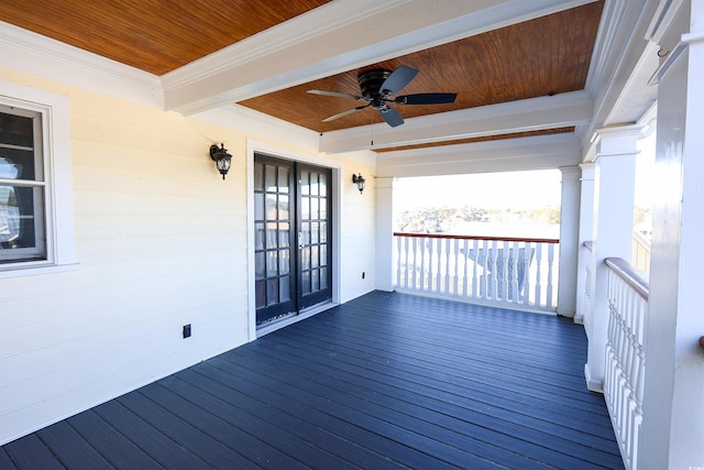 wooden deck with french doors and ceiling fan