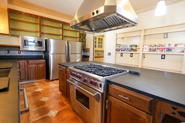 kitchen with light tile patterned floors, crown molding, stainless steel appliances, island exhaust hood, and decorative backsplash