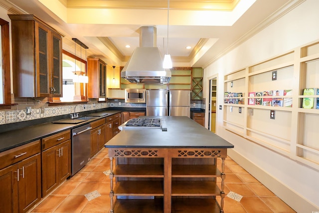 kitchen featuring a kitchen island, island exhaust hood, appliances with stainless steel finishes, and decorative light fixtures