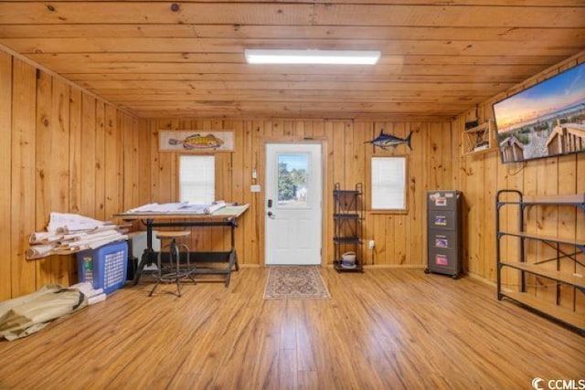 miscellaneous room with hardwood / wood-style floors, wood ceiling, and wooden walls