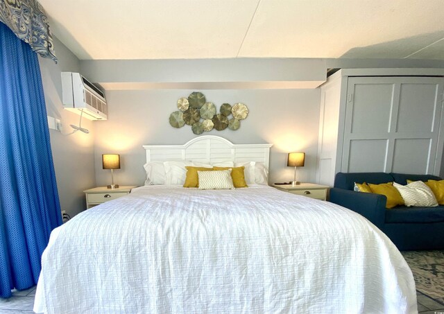 1207 S Ocean Blvd Unit 20207, Myrtle Beach, SC 29577 - bedroom with a wall unit AC