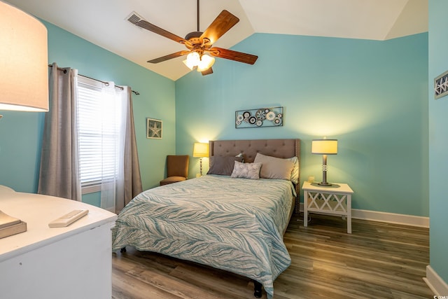 bedroom with ceiling fan, baseboards, vaulted ceiling, and wood finished floors