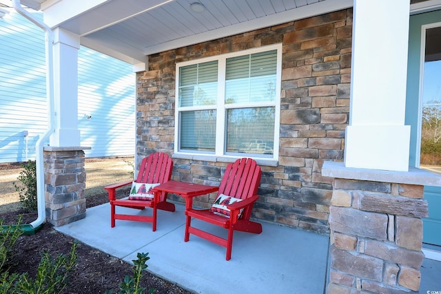 view of patio featuring a porch