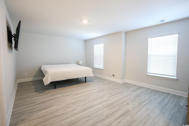 bedroom featuring light hardwood / wood-style flooring