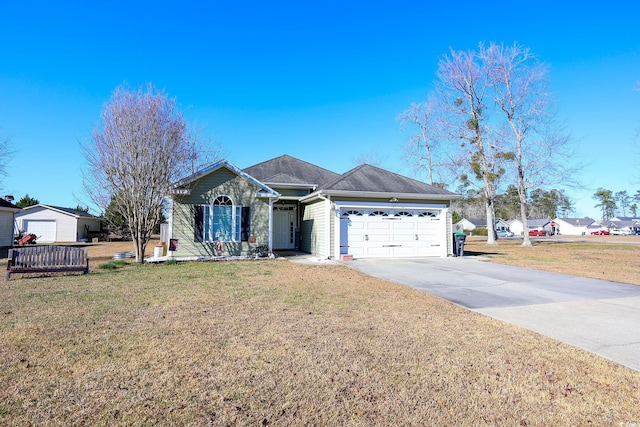 ranch-style home with a garage and a front yard