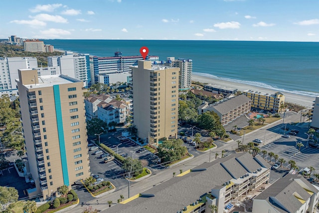 bird's eye view with a view of the beach and a water view