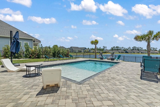 view of swimming pool featuring a patio area