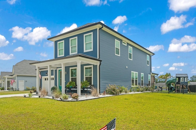 exterior space with a porch and a lawn