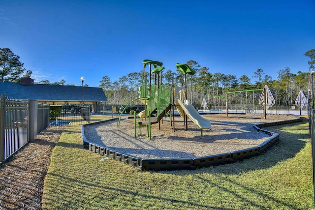 view of playground with a yard