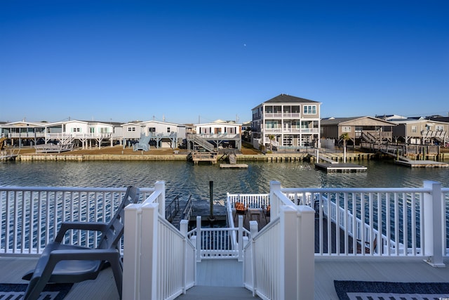 view of dock with a water view