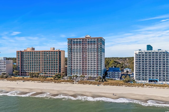 aerial view with a view of the beach and a water view