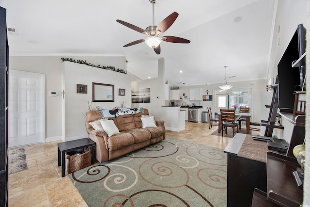 living room featuring ceiling fan, lofted ceiling, and crown molding