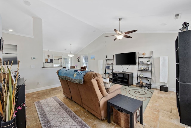 living room featuring ceiling fan, crown molding, and lofted ceiling