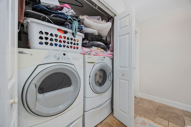 laundry area featuring separate washer and dryer