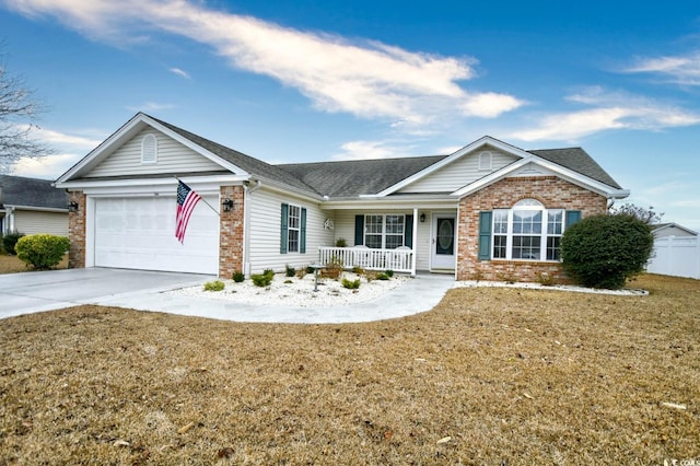 ranch-style home featuring a garage, a front lawn, and a porch