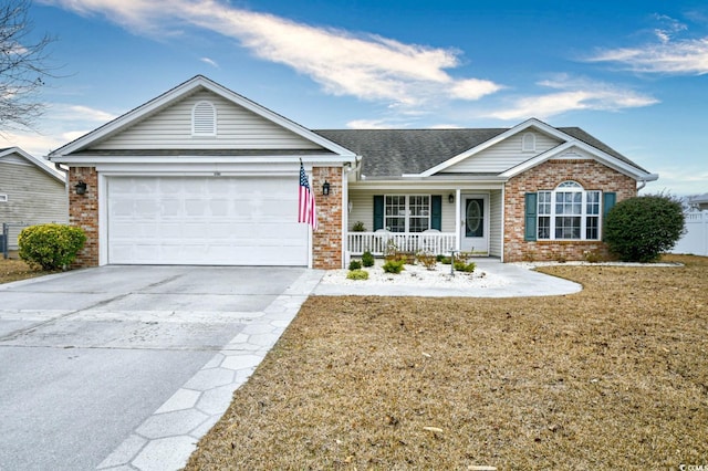 ranch-style house with a porch, a garage, and a front yard