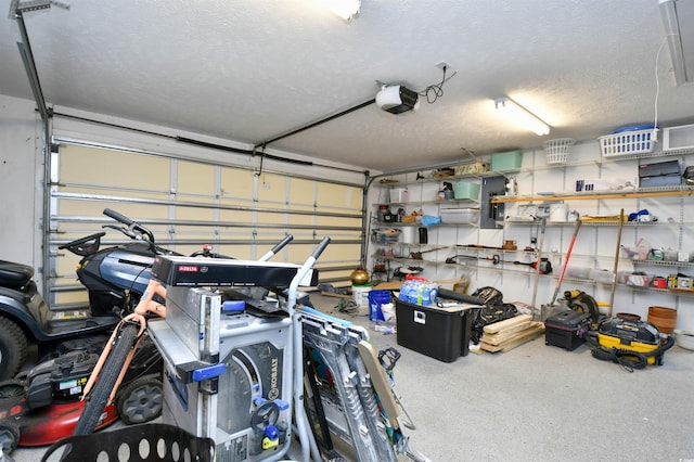 garage featuring a garage door opener