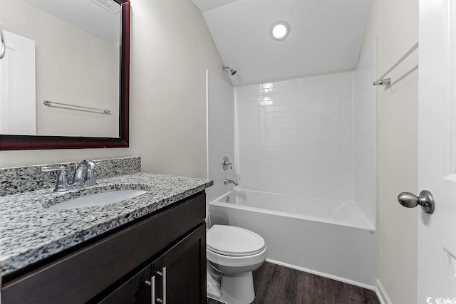 full bathroom featuring bathtub / shower combination, wood-type flooring, vanity, and toilet