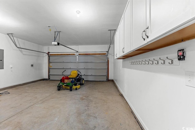 garage with electric panel and a garage door opener