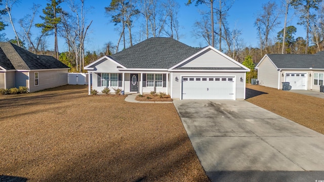 single story home with a garage and a front yard