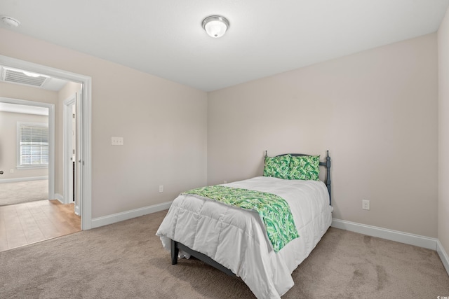 bedroom featuring carpet flooring